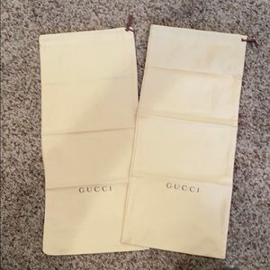 Never used pair of Gucci dust bags